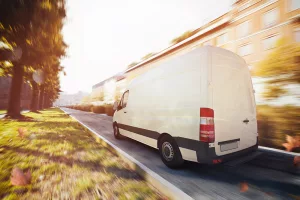 Trucks drive in the city streets for deliveries. 3D Rendering Think like a thief to stop your van being broken into