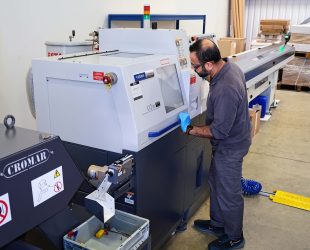 Sliding-Head Lathe Cuts Tungsten Bar 12 Hours a Day