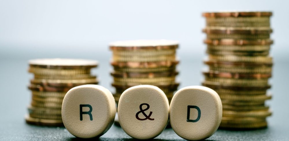 R&d,Letter,Block,And,Stack,Coins,,Business,Concept.,R&d,Stands