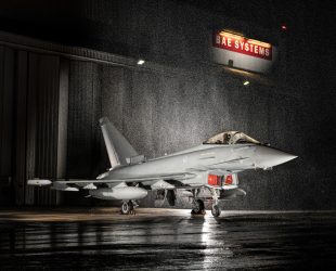 A Eurofighter Typhoon aircraft sitting outside the BAE Systems final assembly line in Warton, Lancashire, UK.