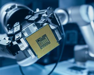 Modern High Tech Authentic Robot Arm Holding Contemporary Super Computer Processor. Industrial Robotic Manipulator End Effector Holding CPU Chip